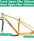 Gold bike frame with suspension fork, showing 100mm front and 120mm rear open file measurements, no wheels attached.