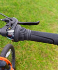 Right Hand Shift Lever For 3 To 7 Speed Bicycles With Twist Grip Gear Shifter SL RS35 on bike handlebar, grass background