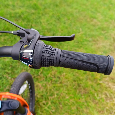 Right Hand Shift Lever For 3 To 7 Speed Bicycles With Twist Grip Gear Shifter SL RS35 on bike handlebar, grass background
