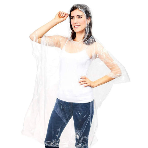 Woman wearing One Size Clear Hooded Disposable Rain Ponchos For Adults Bulk Pack Grab N Go For Camping Festivals Hiking Emergency Rain Gear Lightweight Plastic Ponchos For Dry Comfort In Sudden Downpours