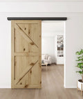 Sliding Barn Door Hardware Track Kit 8 Foot Aluminium Alloy Box Rail Wall Mount For Interior Wooden Doors Suitable For Door Panels 1 3/8 To 1 3/4 Inches Thick Maximum Load 130 Lbs Easy To Install With Detailed Assembly Manual installed on wooden door