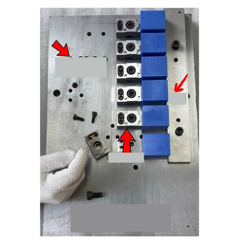 Beefy CNC Clamp Vise for Multi-Station Pneumatic Milling with Single-Sided OK Clamp, showing metal and blue clamping components.