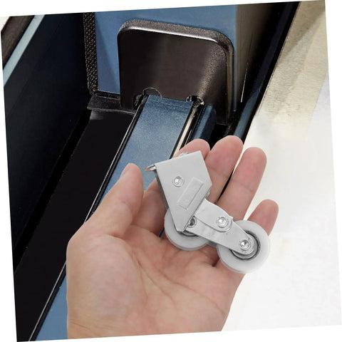 Heavy Duty Four Pack Aluminum Alloy Sliding Door Pulleys With Double Wheel Bearings and Smooth Gliding Track Rollers in hand.