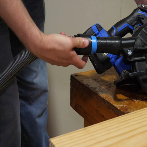 Person connecting hose to power tool with Assembled Quick Click Dust Separator And 5 Gallon Locking Collection Bin With Caster Dolly