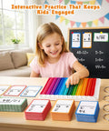 Child using Math Flash Cards Set for Kids 4-8, 288 Double-Sided Cards with Chart and Storage Ring, colorful board on table