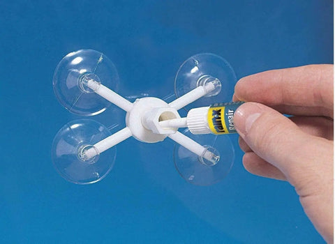 DIY Windshield Repair Kit For Chips Cracks And Bullseyes That Keeps Laminated Windshields Clear in use with suction cups and resin application