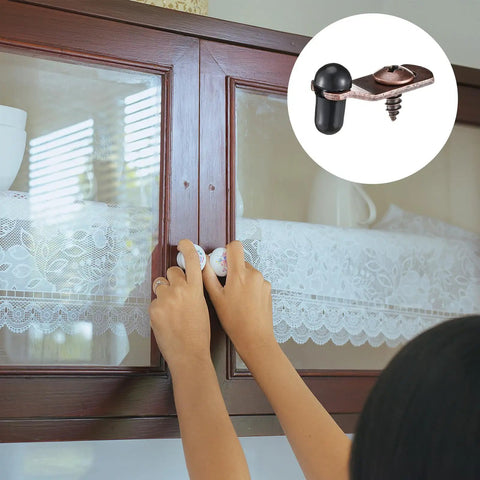 Rock Solid Antique Bronze Glass Retainer Clips Bundle Arrives Fully Loaded With All Needed Screws And Snug Silicone Sleeves For Zero Hassle Cabinet Door Setup And Dependable Everyday Performance in use on cabinet doors.