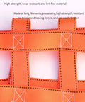 Heavy Duty Hoisting Net For Secure Equipment Transport And Construction Projects 100x100 Cm Mesh Grid 10 Cm 300 Kg Capacity Built For The Jobsite Pro Grade Industrial Strength Lifting Net close-up of orange webbing