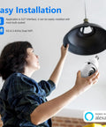 Woman installing Top Tier 5G And 24G Dual Band Wifi Light Bulb Security Camera For Outdoor Home Surveillance in a ceiling fixture.