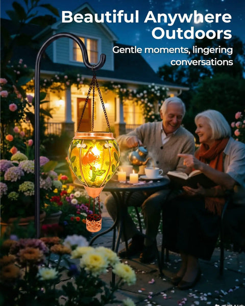 Glass Hot Air Balloon Solar Lantern With Flame Hand Painted Artwork Realistic Flickering Flame Hummingbird Accent Rustproof Metal Outdoor Solar Light For Garden Or Yard Easy Setup And Eco Friendly glowing in garden