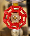 Close-up of Red Metal Gate Valve Handwheel Set Five Pack For One Half Inch Hose Bibs Replacement Handles For Faucets And Valve Shutoffs
