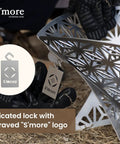 Close-up of a sturdy steel Portable Camping Fire Pit With Grill For Cooking, Outdoor Stove With Storage Bag, featuring an engraved S'more logo.