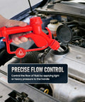 Hand using Beefy Electric Drum Pump With 120V AC and 12V DC Power, 33.5 to 49 Inch Telescoping Suction Tube, Swivel Nut Nozzle, 5 GPM Max, Versatile DEF Diesel Water Pump For Auto Shop And Industrial Use, Red on engine