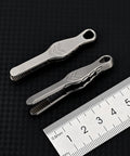 Alloy Pocket Tweezers For Camping And Hiking Gear next to ruler showing size, Compact Portable Tool, Rust Resistant, Multipurpose Splinter Remover