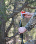 Person holding Pocket Ready Muzzleloader Quick Loader Kit With BH209 Tubes And Funnel
