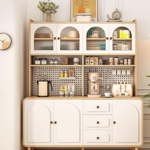 White kitchen cabinet with round pulls, coffee maker, cups, and decor, showcasing Antique Copper Kitchen Cabinet Knobs 12 Pack Round Cupboard Drawer Pulls for Closet Wardrobe Dresser Doors with M4 Screws Vintage Zinc Alloy Hardware Built To Last Easy Install Retro Vibe For Any Furniture Makeover.