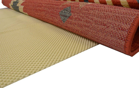 Eco Friendly Non-Slip Rug Pad For Area Rugs And Runners With Extra Cushion Breathable Design To Prevent Bunching And Odor Made From 100 Percent Plant Based Oils Easy Vacuuming Grippy Grip Ex 6'7" X 9'6" shown securing a colorful area rug
