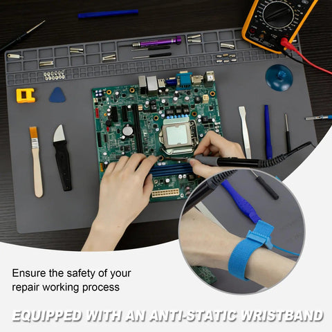 Hands repairing electronics on Extra Large 23.7x13.8 Inch Soldering Mat With ESD Wrist Strap Kit, grey silicone pad.