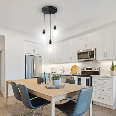 Sleek 3 Light Cluster Pendant In Black With Clear Glass Shades Adjustable Vintage Hanging Light For Kitchen Island Dining Room Foyer And Hallway E26 Base Fixture in modern kitchen.