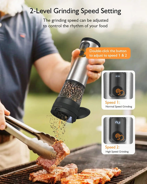 Close-up of Electric Salt And Pepper Grinder Set With 2 Speed Modes 5 Coarseness Settings over steak on grill