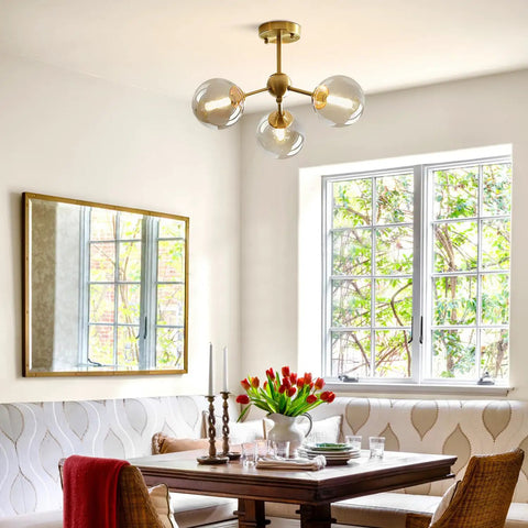 Dining room with Amber Glass Bubble Sputnik Chandelier In Brass Gold Finish, 3 Light Semi Flush Mount Ceiling Light