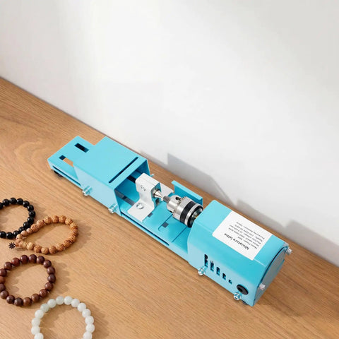 Super Compact Mini Wood Lathe Machine Featuring 96W Motor And Seven Adjustable Speeds Up To 9000Rpm For Precision Turning with blue metal body
