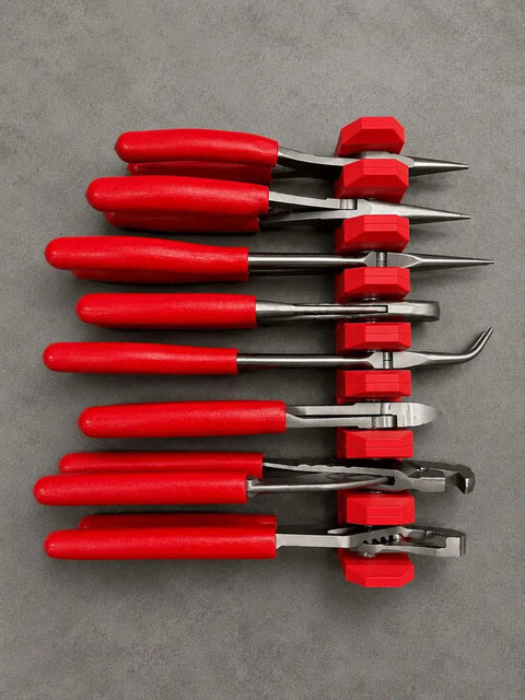 Red-handled tools in Modular Magnetic Pliers Organizer With Adjustable Tool Holder Rack For Pliers Cutters Wrenches And Hand Tools