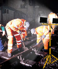 Two-Head LED Work Light With Adjustable Foldable Tripod Stand, 21000 Lumen Portable Flood Light illuminating a job site at night