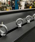 Built Like A Tank Heavy Duty 8 Pack 3/4 X 4 1/2 Inch Shoulder Eye Bolts With Nuts secured to equipment surface.