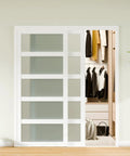96 Inch Double Sliding Closet Doors With 5 Lite Frosted Glass Pantry Panels in a bedroom setting, showing closet interior.