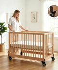 Four Pack 2 Inch Side Mount Casters With Silent Fixed L Bracket Wheels on wooden crib in sunny room, designed for smooth movement.