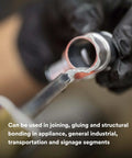 Applying Two-Part Epoxy DP125 Gray for bonding metal, showcasing its use in industrial applications, 400 mL Duo-Pak visible.