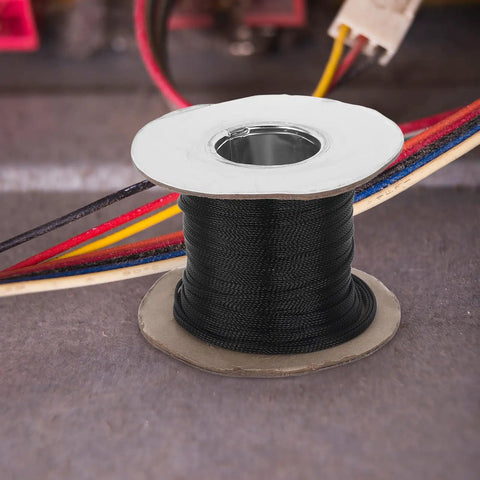Flame Retardant Braided Cable Sleeve For Power Cords And Data Cables Breathable Mesh Wire Protector Tube on a spool with colorful wires.
