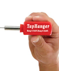 Person holding TapHanger tool for the Drywall Picture Frame Hanging Kit With 80 TapTacks For Quick Tool Free Mounting Of Wooden Frames And Canvases Hang 40 Pictures In Minutes Without Nails Wires Or Wall Damage Up To 20 Pounds