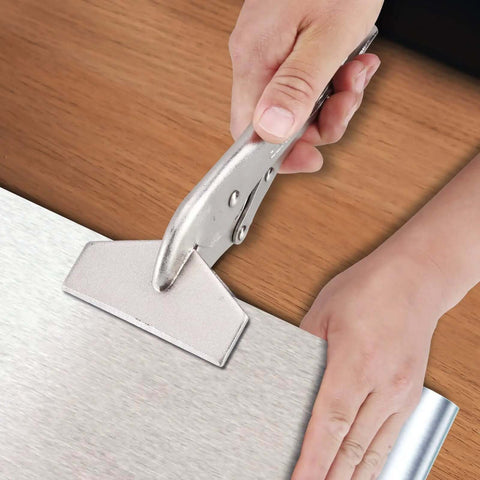 10 Inch Locking Sheet Metal C Clamp clamping sheet metal on wooden table, for fabrication and welding, with precision jaws.