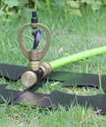 Genuine Real Deal Rooftop Sprinkler System For Wildfire Ember Defense Built Like A Tank with alloy head and green hose on grass.