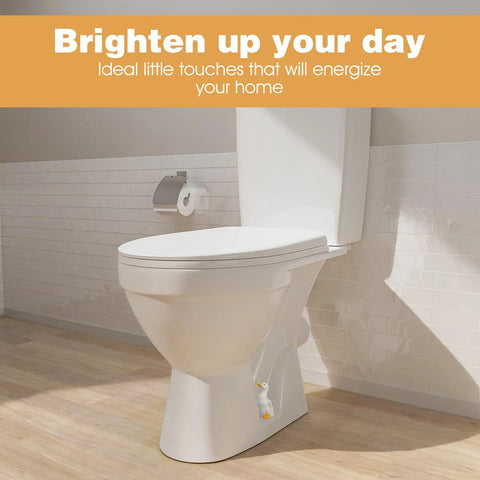 Adorable Ceramic Duck Toilet Bolt Covers Two Pack Decorative Screw Caps With Slick White Finish And Universal Fit adds charm to a white toilet.