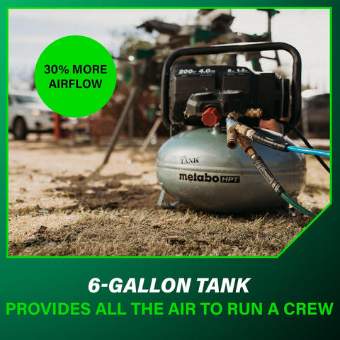 The Tank Portable Pancake Air Compressor 200 PSI 6 Gallon Tank on jobsite with hose attached