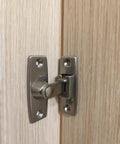Beefy 2.5 Inch Forged Solid Brass Door Latch 1 Pack For 90 Degree Right Angle Doors And Windows, Antique Brass Finish, mounted view