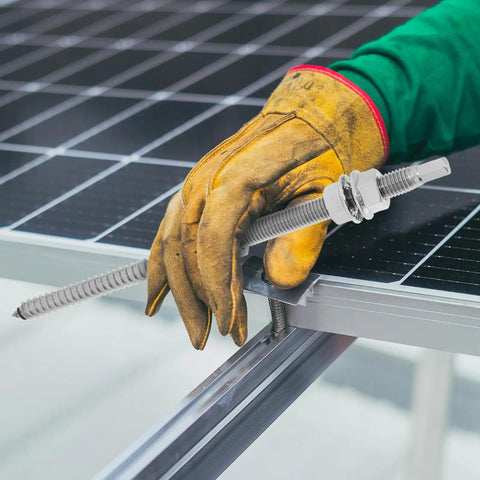 Stainless Steel Solar Mounting Hanger Bolts Heavy Duty Fasteners Built Tough For Rock Solid Roof Panel Securing And Smooth Gate Hardware Installations with gloved hand on solar panel.