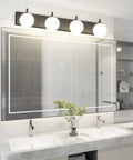 Slick Matte Black 4 Lights Bathroom Vanity Light Fixtures With Milky Glass Globes, above double sink in modern bath.
