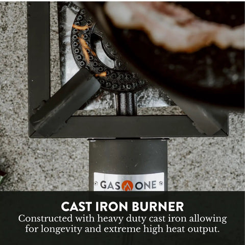 Top view of high pressure propane burner for outdoor cooking with heat shield and guard, featuring a cast iron burner.