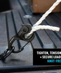 CamJam XT Aluminum Rope Tightener Large With Carabiner Clip used to secure white rope on truck bed