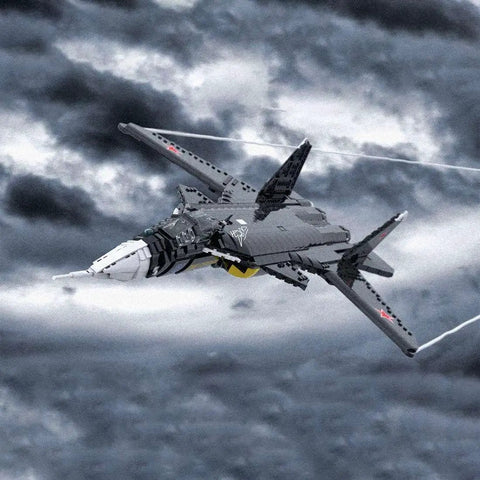One Thirty-Fifth Scale Su-47 Berkut Fighter Jet Building Blocks Kit modeled in dynamic flight scene against cloudy sky.