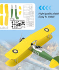 O2U-4 Corsair Biplane Model Kit 1 To 48 Scale For Adults, top view showing assembly pieces and yellow wing.