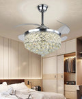 Smooth Operator 42 Inch Dimmable Crystal Retractable Fandelier With Remote And Invisible LED Panel Lighting a stylish ceiling fan in a modern bedroom.