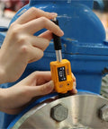 Hassle Free Universal Hardness Tester For Steel Aluminum And Metal Alloys measuring hardness on metal surface with digital display.