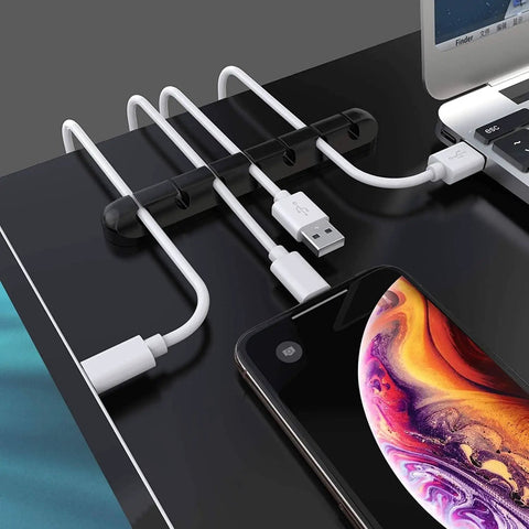 Three Pack Cable Holder Clips For Cord Management Self Adhesive Silicone Clips holding USB cables on desk