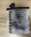 Transparent bag with text on wooden table, containing items related to Six Pack Golf Ball Pick Up Retriever Grabber Set.