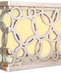 Illuminated Door Chime System With Hand Carved Circular LED Design In Brushed Nickel, glowing with frosted glass shade